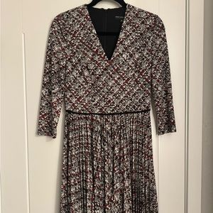 Red, black, and white marble print Maggy London crystal pleat dress